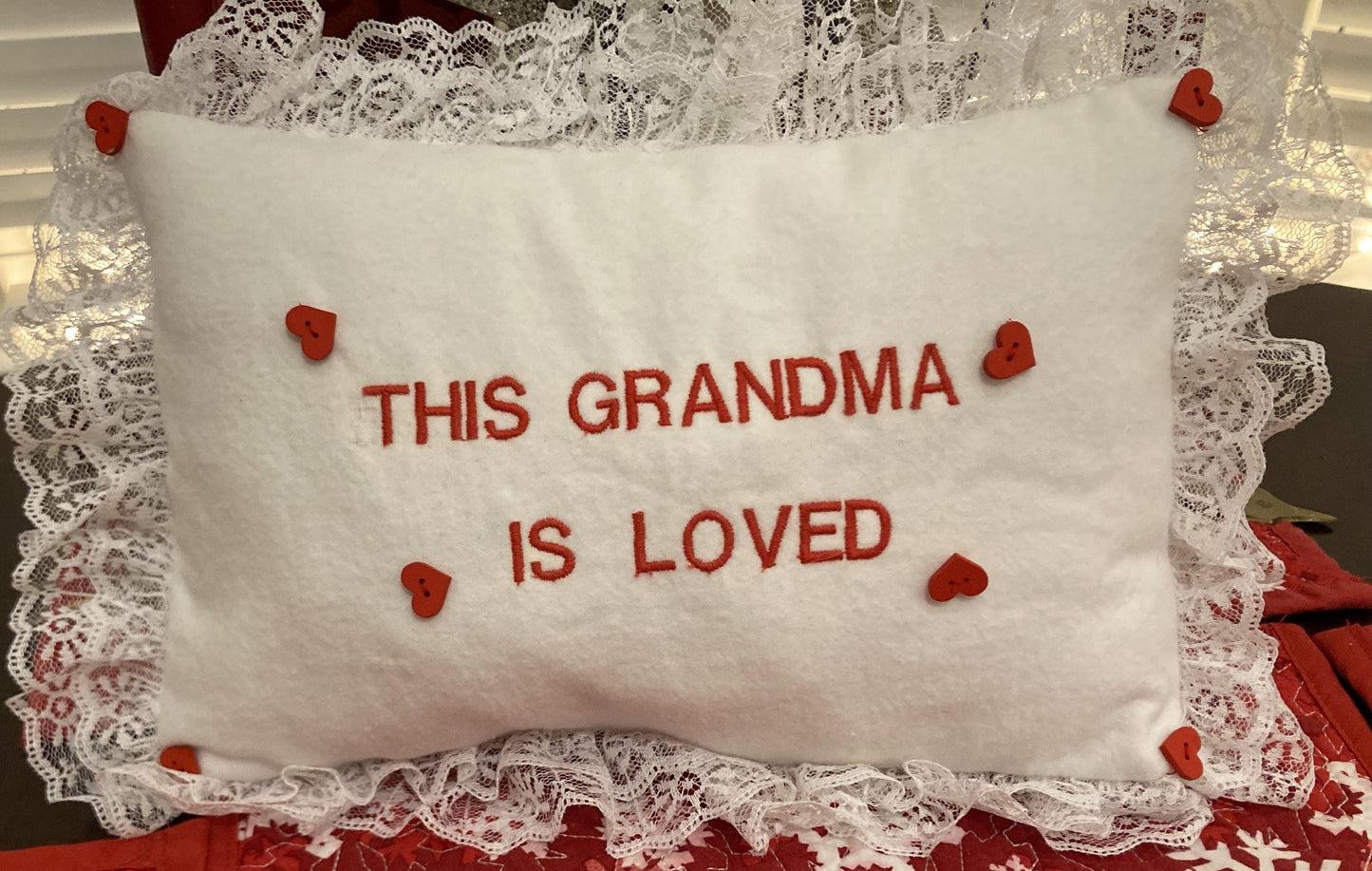 Grandma pillow embroidered in red