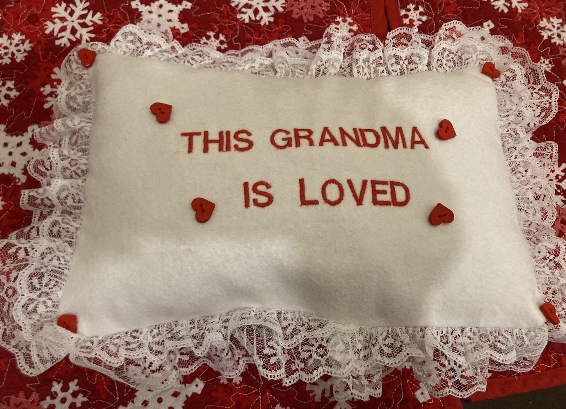 Grandma pillow embroidered in red