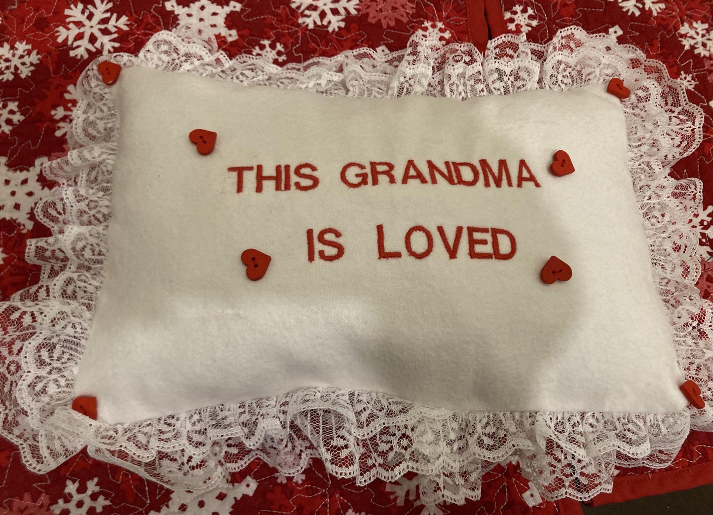 Grandma pillow embroidered in red