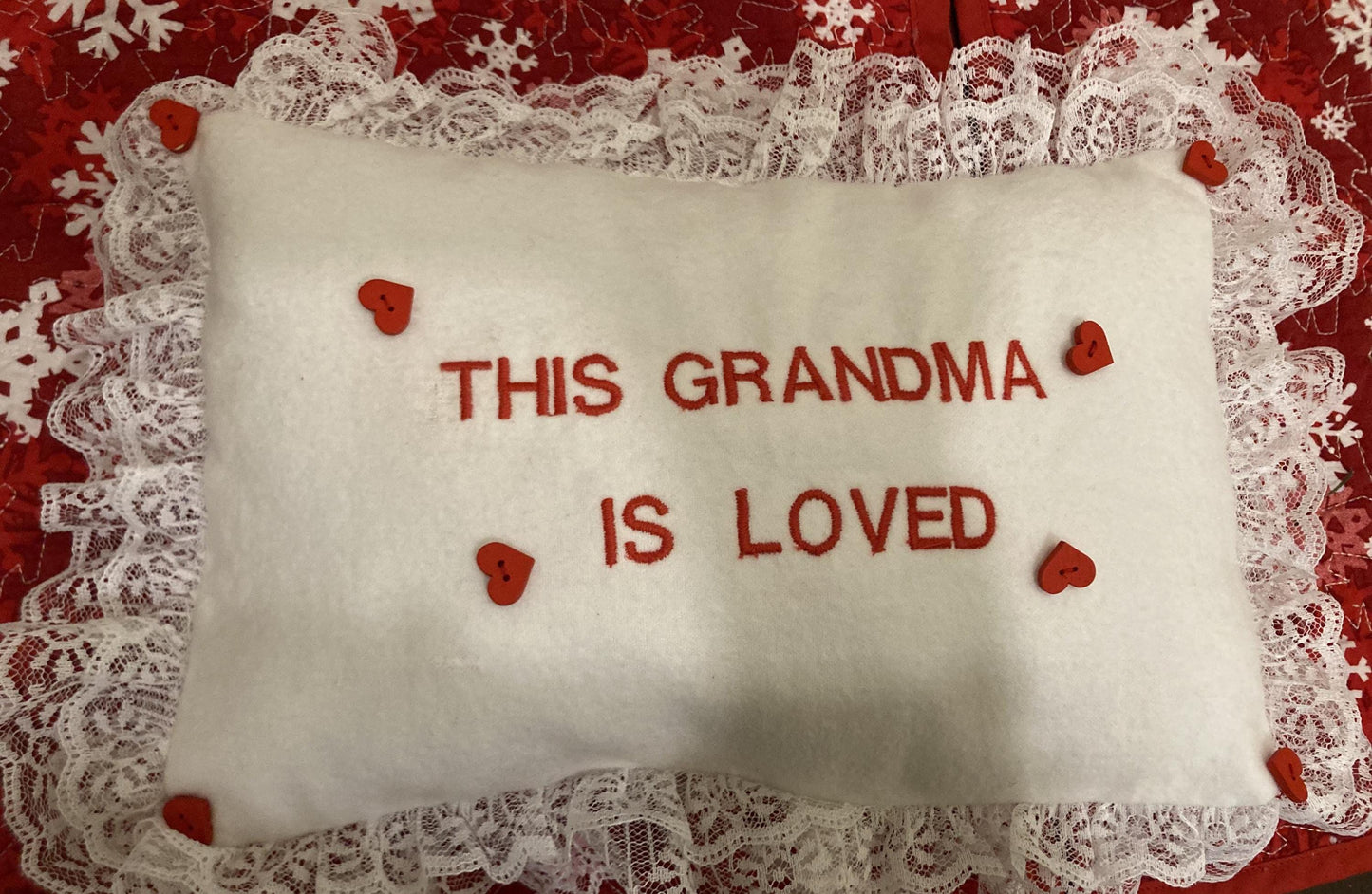 Grandma pillow embroidered in red