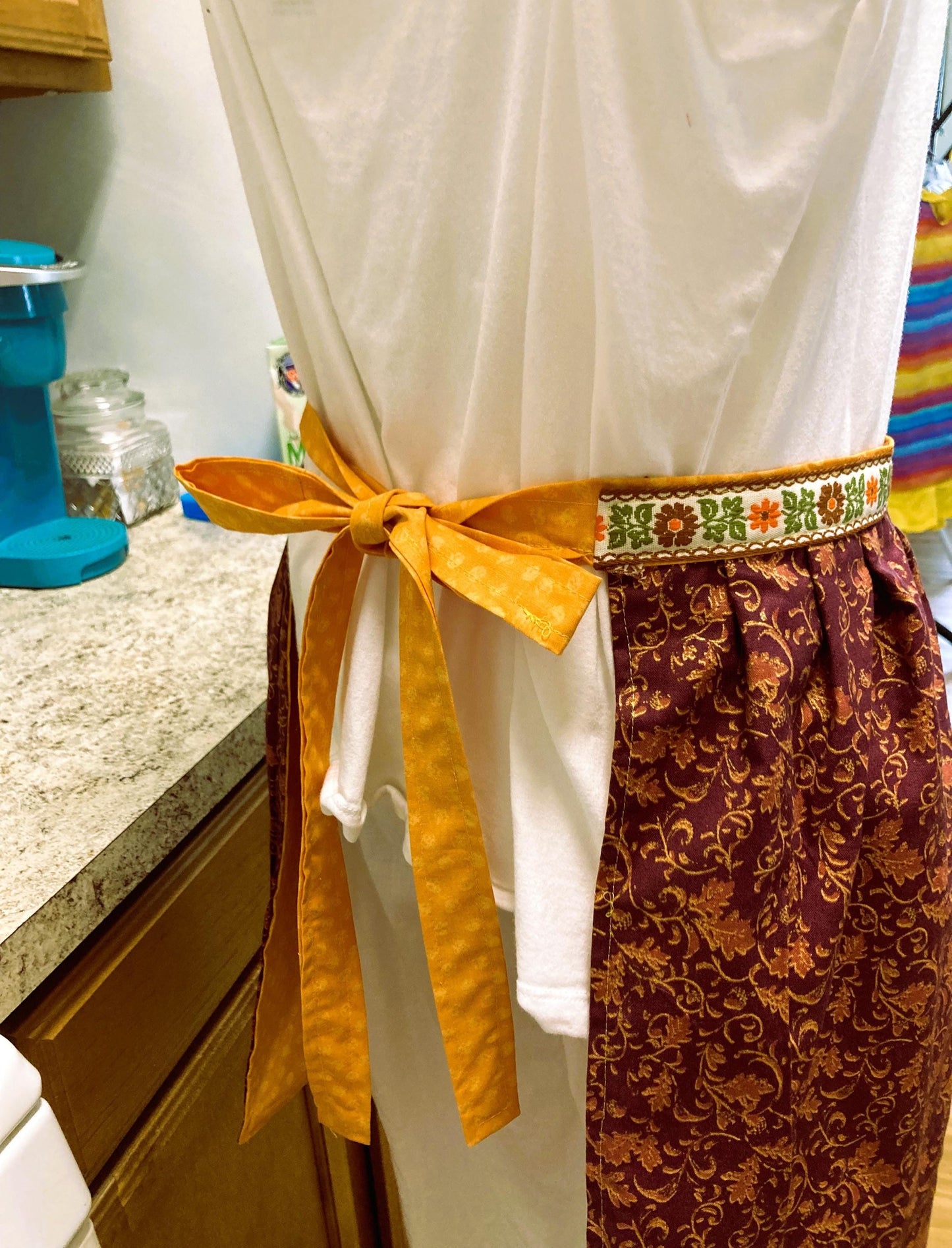MOM Cross Back Apron and Half Apron in browns and golds