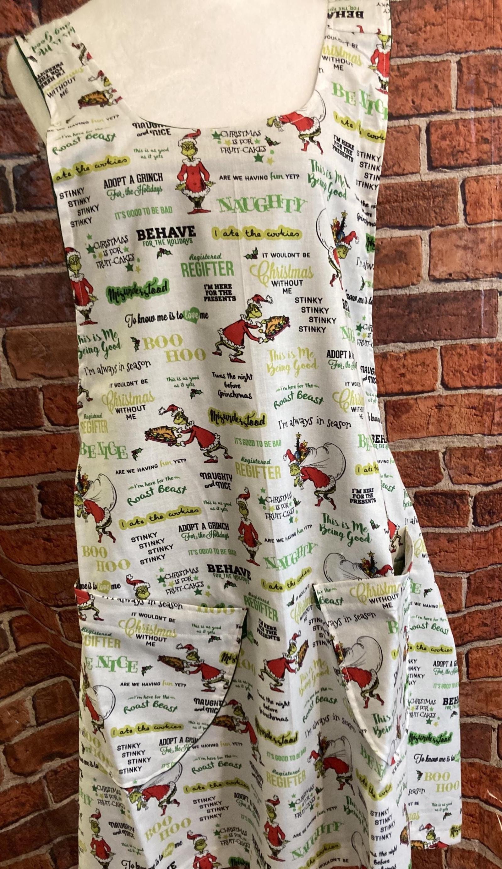 GRINCH CHRISTMAS SAYINGS on Reversible Cross Back Apron